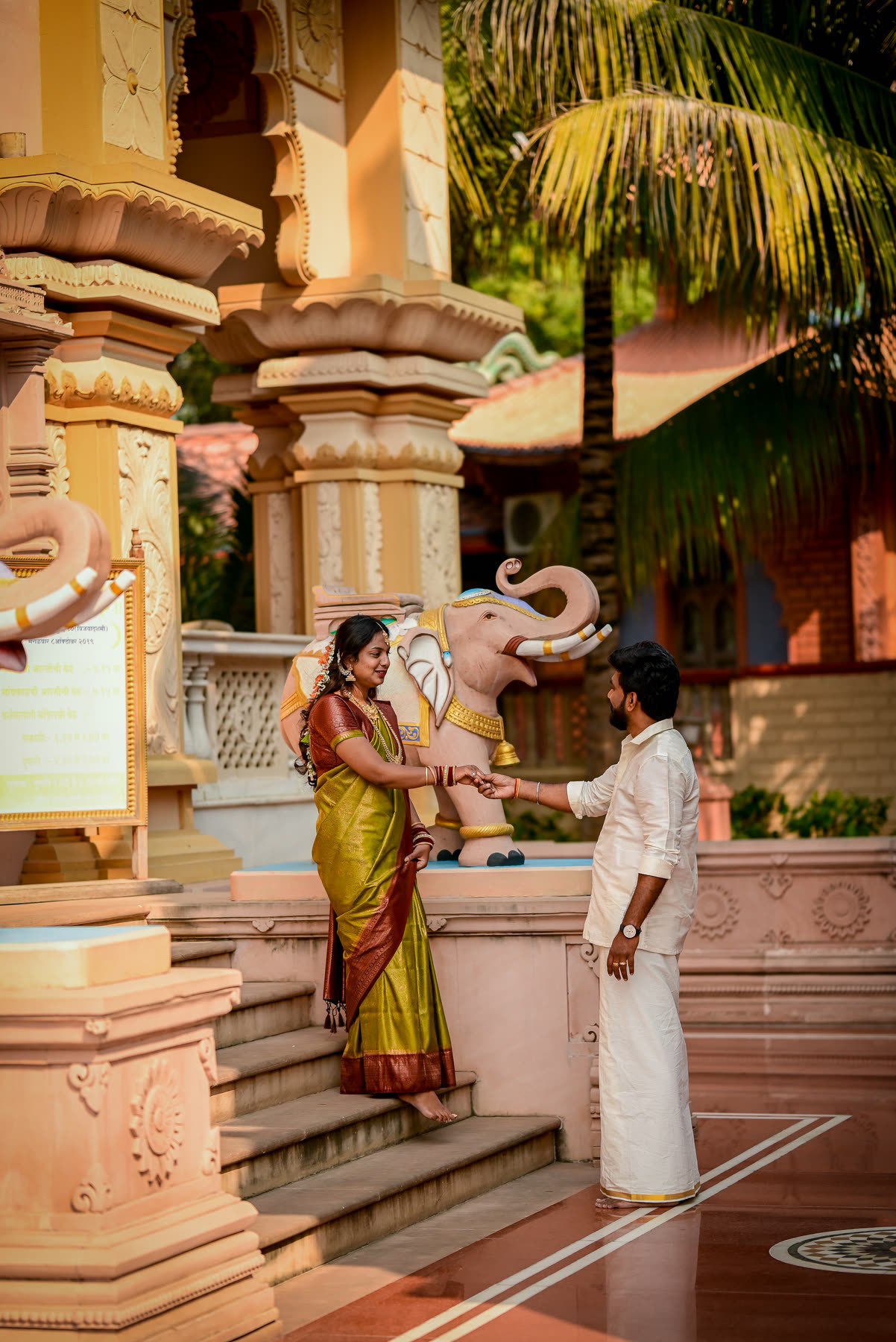 An offered hand on the temple steps