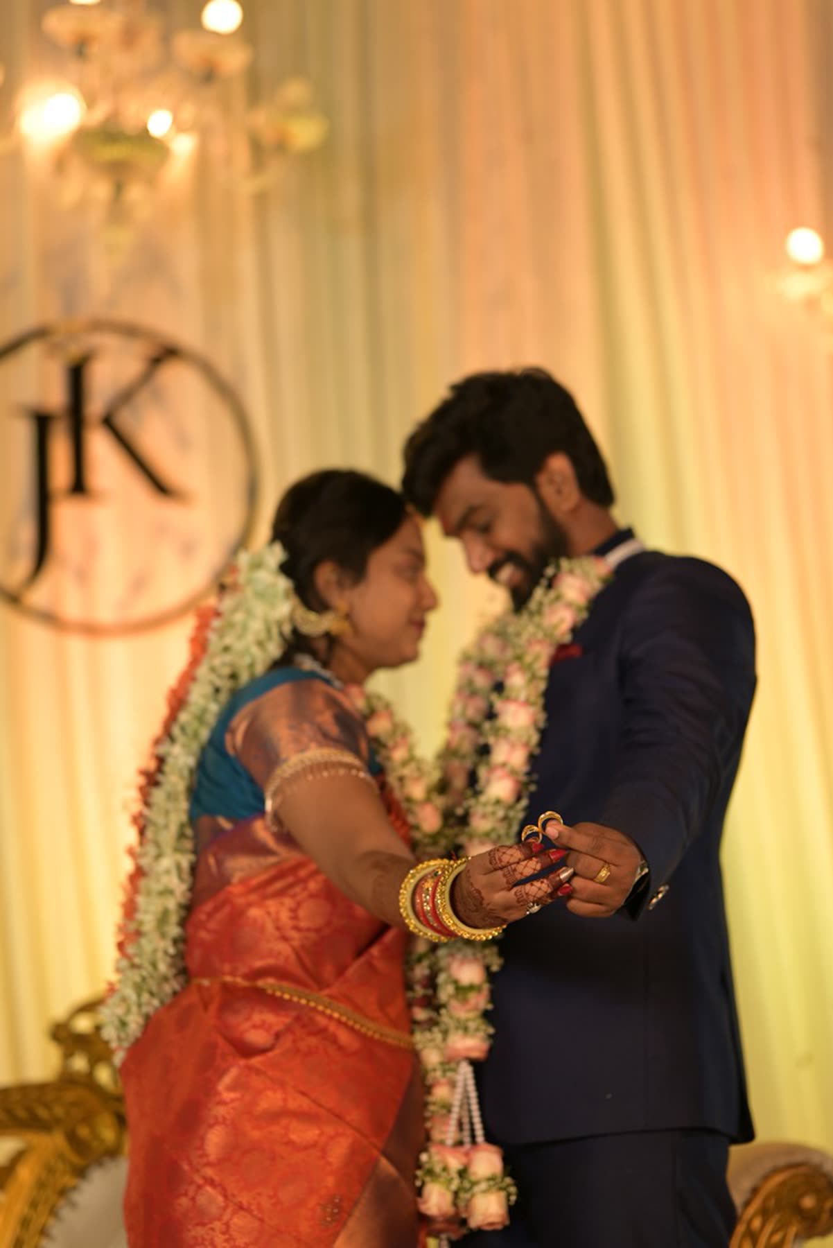 The ring exchange under the reception monogram